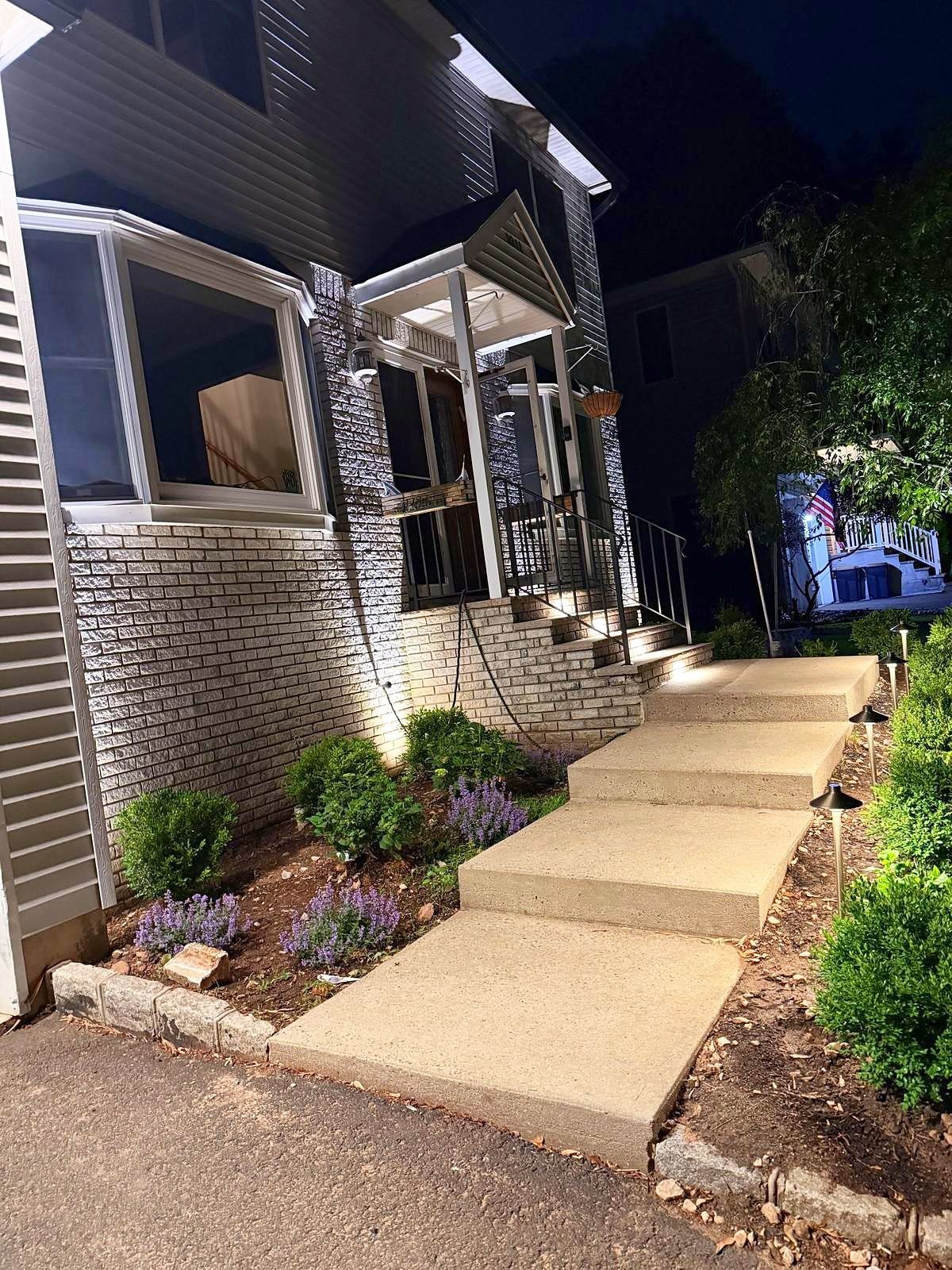 Front steps and walkway lit with low voltage path lights