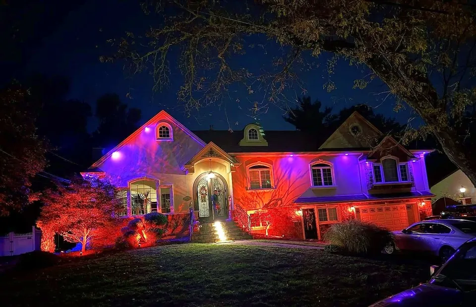 Stucco colonial in orange and purple for Halloween