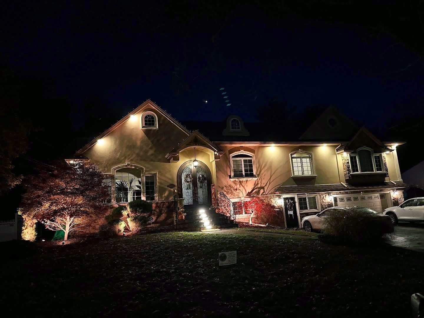 House in everyday warm white permanent lighting